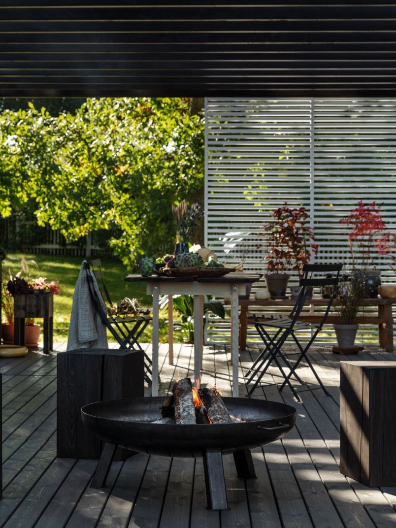 dark colour terrace in pergola