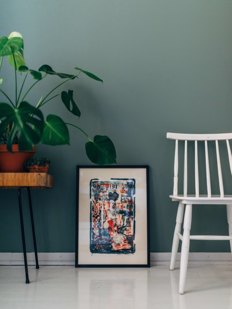 green wall with chair