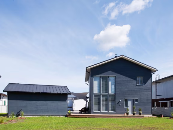 stylish finish of a wooden house painting project
