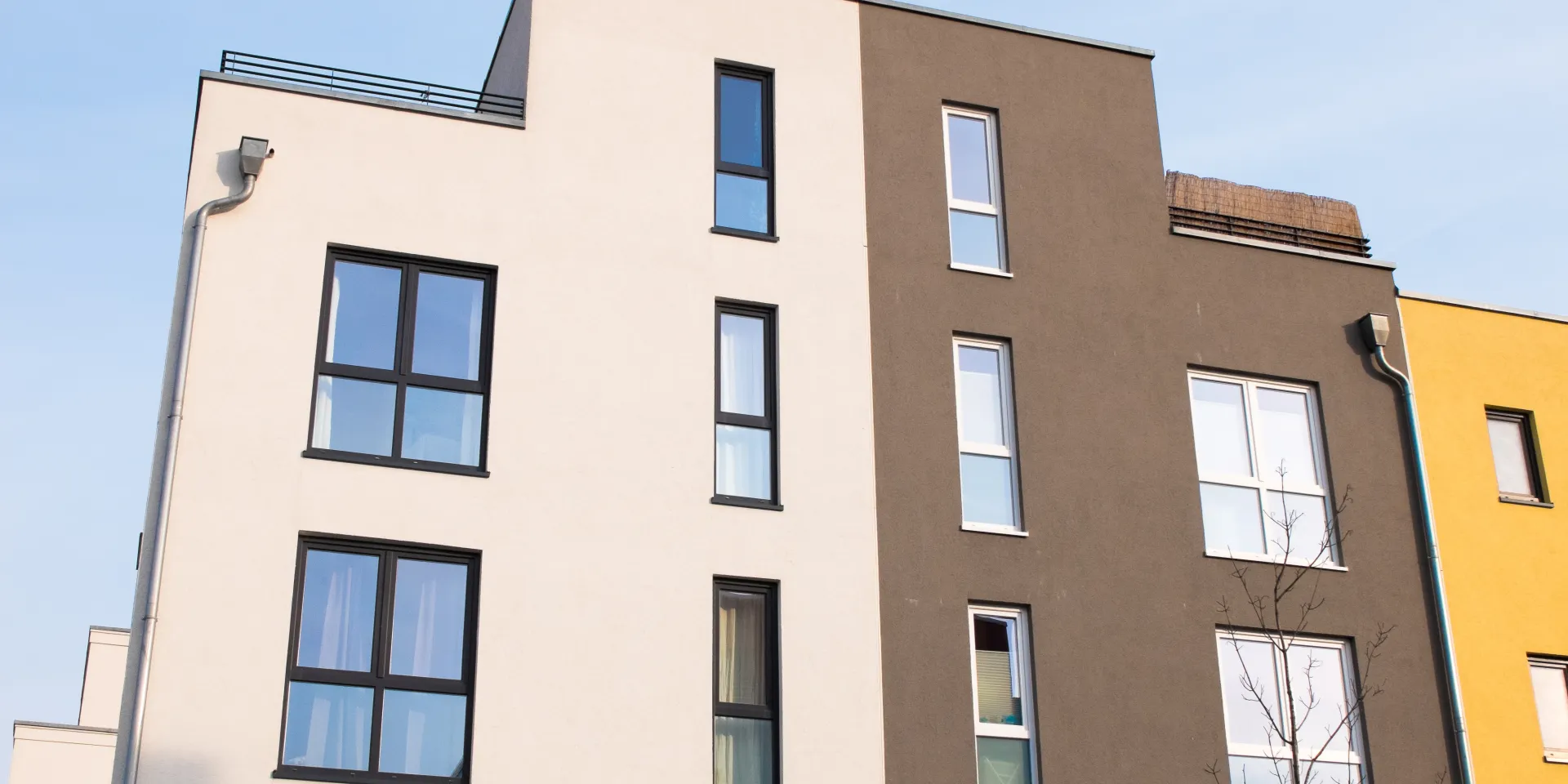 Colourfull mineral facade in apartment building