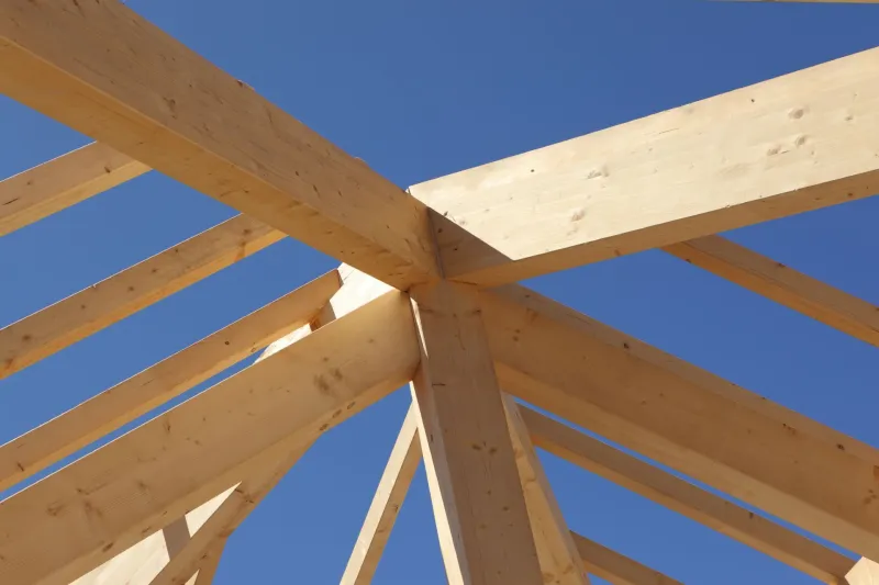 Laminated wooden construction elements