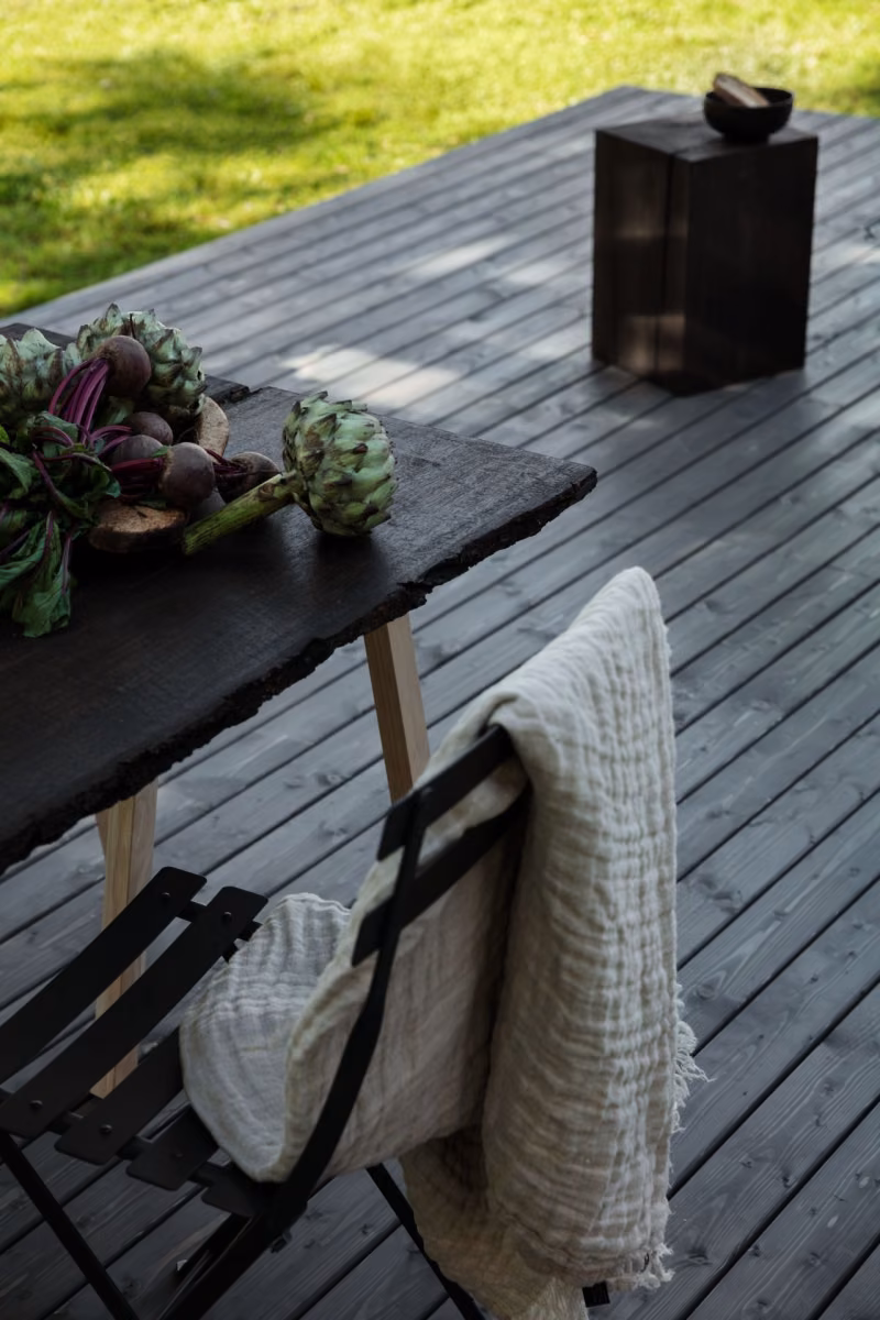 dark colour terrace and wooden furniture