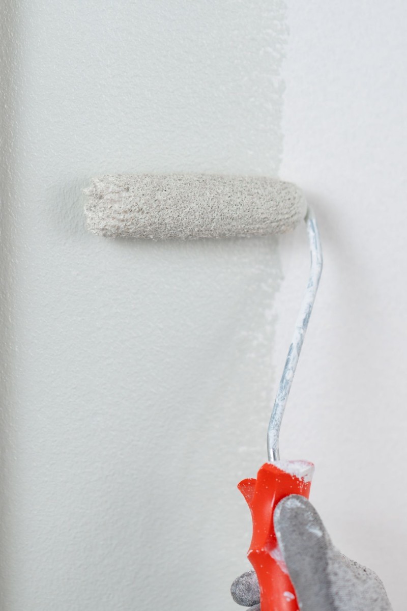 painting wall with roller