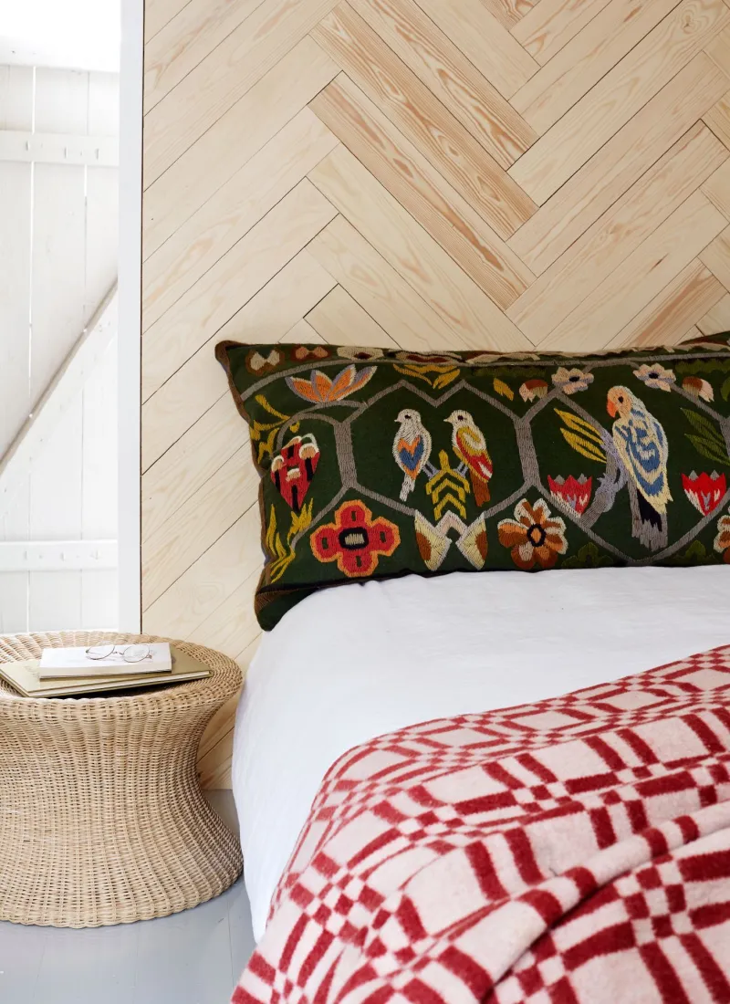 light colour wooden panel wall in bedroom
